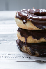 Stack of Chocolate Iced Donuts