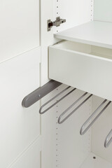 details of accessories for clothes inside the closet