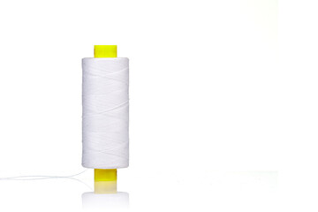 a skein of thread white colors macro on a white background