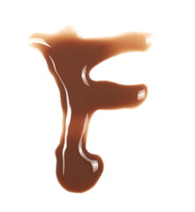 Spilled chocolate milk puddle in shape letter F isolated on white background, top view