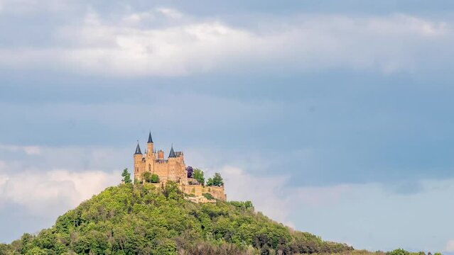 Hohenzollern Castle timelapse movie clouds going by zooming out