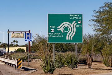 sign at the roundabout in historic Wickenburg, Arizona for US 60 toward Wickenburg and Los Angeles, and US 93 toward Kingman and Las Vegas.