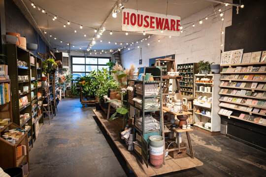 Merchandise On Display Below String Lights In Housewares Store