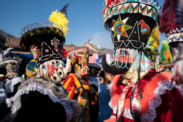 Chinelo or Chinelos are a traditional colorful costumed dancer in carnaval, is popular in the Mexican state of Morelos near Tepoztlan , State of Mexico and Mexico City, Milpa Alta and Xochimilco.