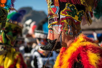 Chinelo or Chinelos are a traditional colorful costumed dancer in carnaval, is popular in the...