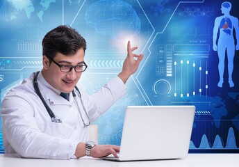 Doctor in telemedicine concept pressing button