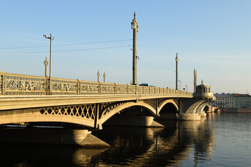 Annunciation Bridge, first permanent bridge built across Neva River in summer early morning. Saint Petersburg, Russia