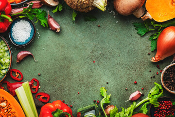 Food background. Vegetables, mushrooms, roots, spices - ingredients for vegan, cooking. Healthy eating, diet, comfort slow food. concept. Rustic table, frame border with copy space, top view - obrazy, fototapety, plakaty