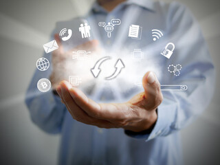 A man using cloud storage or technology with up and down arrows for uploading and downloading information, and data. Big data, cloud computing, ai, virtual hosting, digital business, online activities