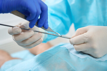Medicine pellet insertion procedure, medical staff use a special tool
