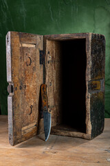 Old wooden box and old knife. Vintage tool. Homemade box and knife.