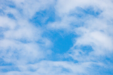 blue sky and clouds, in the photo the sky and white clouds bottom view