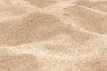 Beige sand natural abstract background soft focus.