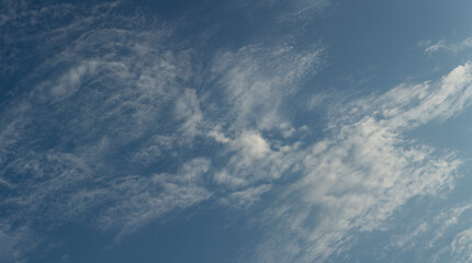Cirrus cloudscape on blue sky. Majestic Clouds.