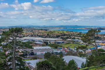 Fototapeta na wymiar New Zealand, View of Auckland city from the Mt Wellington lookout looking east towards the eastern suburbs