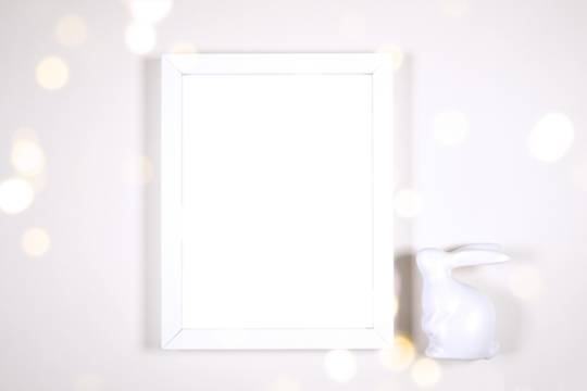 Artwork wall art picture frame product mockup. Happy Easter theme product mockup. Minimal styling with bunny rabbit against a bokeh party lights background. Negative copy space. - Powered by Adobe
