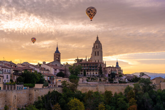 View of Downtown Segovia with hot air balloon in the sky