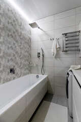 Bright elegant bathroom interior in a luxury house