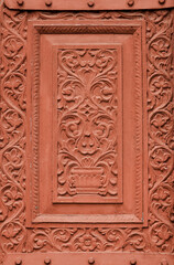 The intricate design carved on red stone at Junagarh fort , Bikaner, India