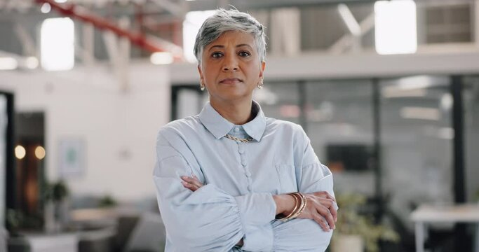 Success, leadership and senior woman in office with crossed arms for vision, ideas and business mission. Manager, ceo and professional elderly worker portrait in corporate workplace with serious face