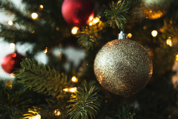 Christmas Scene. A Christmas tree ornament is hanging on the tree. Copy space. Christmas background.