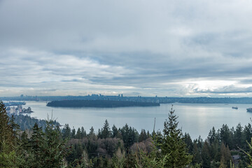 View of The Cypress Pop-up Village lookout with Burrard Inlet and Stanley Park in the background