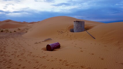 Water reservoir on a moroccan Sahara desert near a bedouin camp in the town of Merzouga.