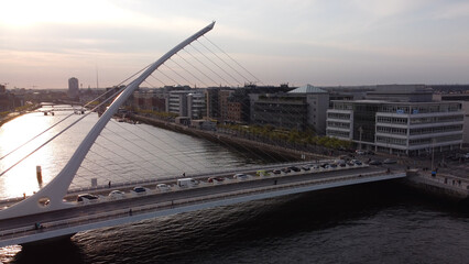 Samuel Beckett Bridge over River Liffey in Dublin - aerial view by drone