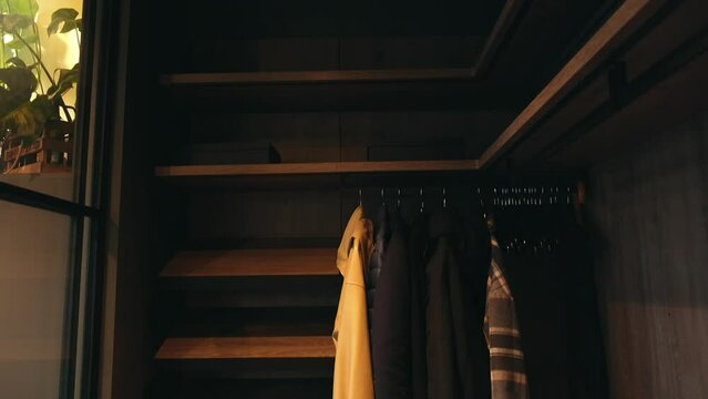 panorama over a small dark wardrobe