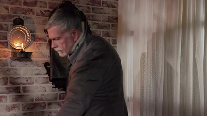 18th century man looking in a mirror getting ready