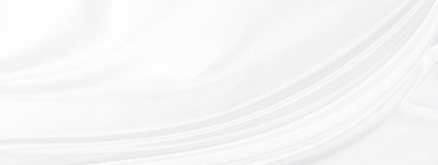 White gray satin texture that is white silver fabric silk panorama background with beautiful soft blur pattern natural.