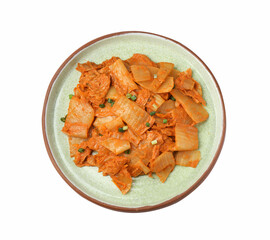 Plate of delicious kimchi with Chinese cabbage isolated on white, top view