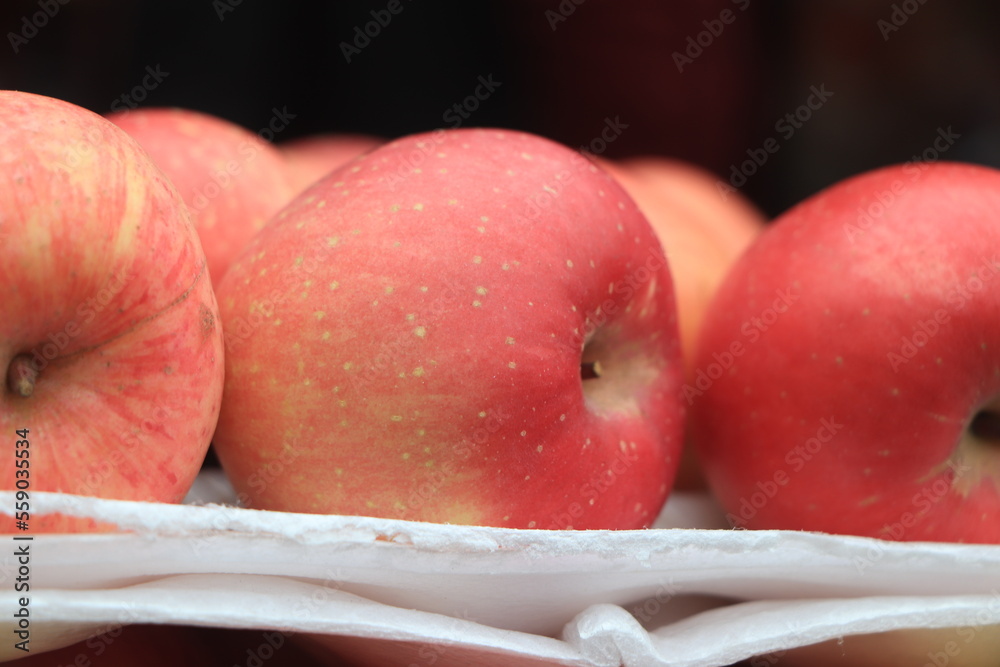 Wall mural background with fresh red apples