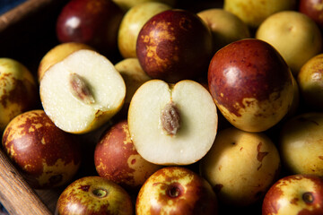 Chinese jujube or winter jujube on wooden table