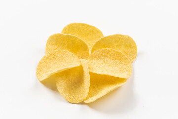Fototapeta na wymiar Pile of potato chips on white background.