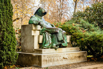 Statue of Anonymous in Vajdahunyad Castle park in Budapest - Powered by Adobe
