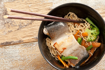 Milkfish fillet with noodles and vegetables