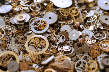 assortment of clockwork watch parts