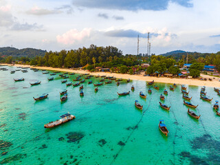 Aerial view of Sunrise beach with long tail boats in Koh Lipe, Satun, Thailand