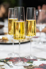three glasses of toast with sparkling wine