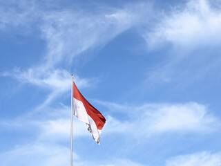 The Merah Putih Flag. View from below. Indonesian flag consist of red and white color symbolizing the color of blood and bone of its people
