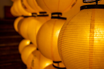 Yellow Chinese lanterns hanging in a row in jinli ancient street, Chengdu, Sichuan province, China - 559063529