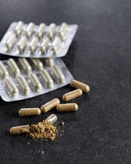 Source of biologically active substances, phytopreparations in capsules, macro, vertical format