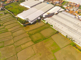 Factory area around farmland in Cikancung area - Indonesia. Not Focus
