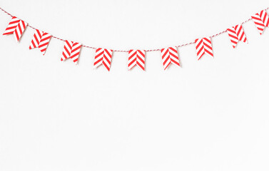 Fototapeta premium Decorative garland, banner with flags on a light background, free space for text, copy space