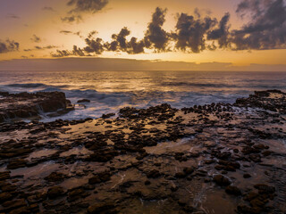Fototapeta na wymiar Dawn at the seaside and rock platform