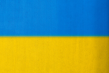 blue and yellow ukraine national flag painted on the wall