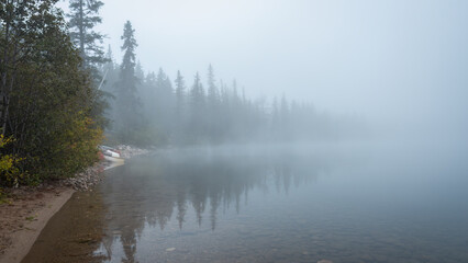 Pyramid Lake in heavy fog, Jasper National park, Canadian Rockies. Canada.