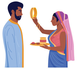 Karwa Chauth festival, Hindu woman in traditonal dress praying for the well-being and longevity of her husband