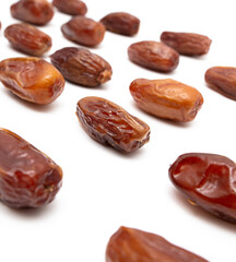 Dried dates isolated on white background.